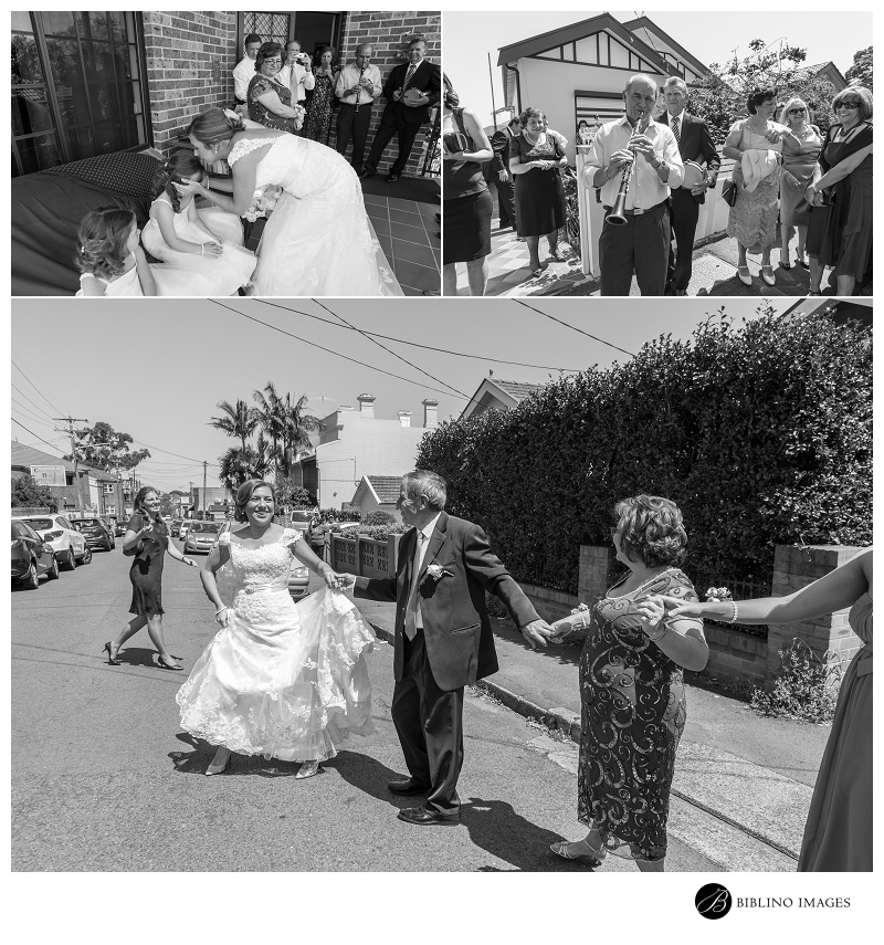 Bride-and-parents-greek-dance-on-the-street-before-going-to-the-ceremony
