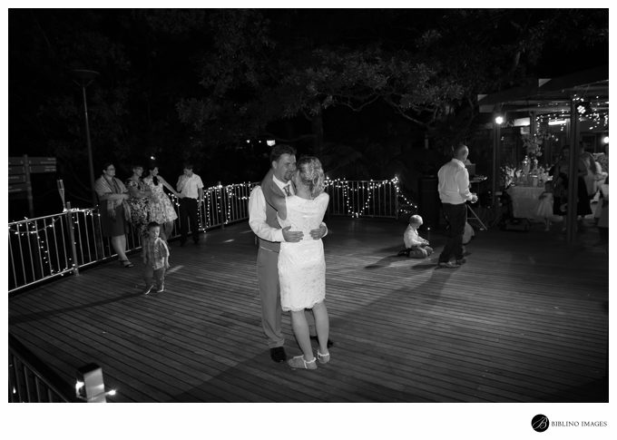 Bride Groom first dance under moonlight on the deck of the botanical gardens cafe