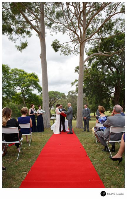 Wedding ceremony under two gum trees